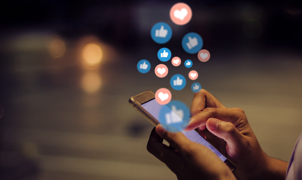 Person using a their smartphone for social media