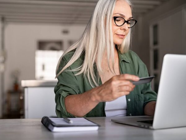 Woman making an online payment from home