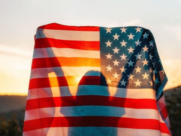 person holding American flag